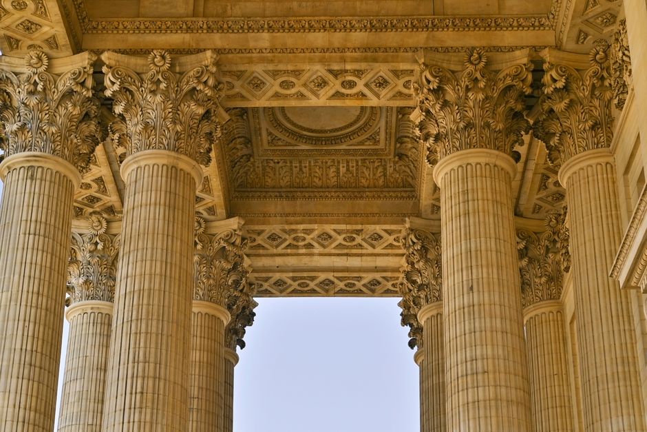Corinthian columns of a classical building, a symbol of justice